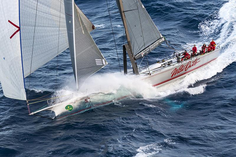 Wild Oats XI sends the spray flying as she pursues LDV Comanche on the morning of the 2017 Rolex Sydney Hobart Yacht Race second day - photo © Rolex / Studio Borlenghi