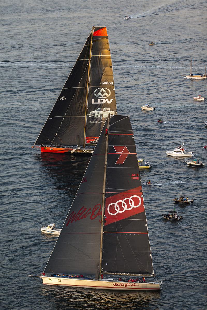 In the river on the way to Hobart and Wild Oats XI begins to overtake LDV Comanche - photo © Andrea Francolini