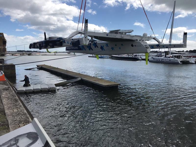 Exit building shed and first splash Maxi Banque Populaire IX. Skipper, Armal Le Cleac'h photo copyright Team Banque Populaire IX taken at  and featuring the Maxi class