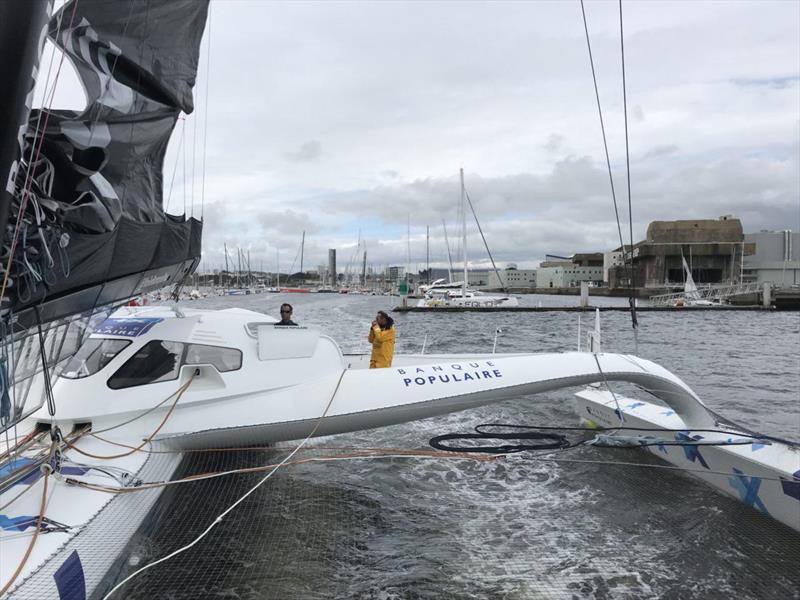 Exit building shed and first splashMaxi Banque Populaire IX. Skipper, Armal Le Cleac'h. - photo © First sail - Team Banque Populaire IX