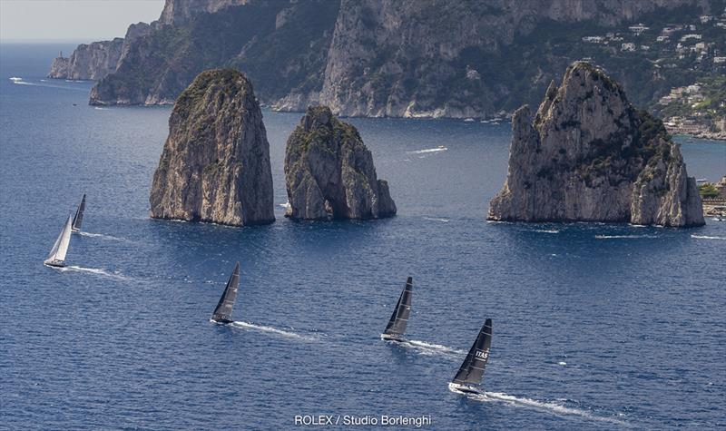 Magnificent landmarks such as the Faraglioni rocks are a huge attraction of Rolex Capri Sailing Week photo copyright Rolex / Carlo Borlenghi taken at Yacht Club Capri and featuring the Maxi class