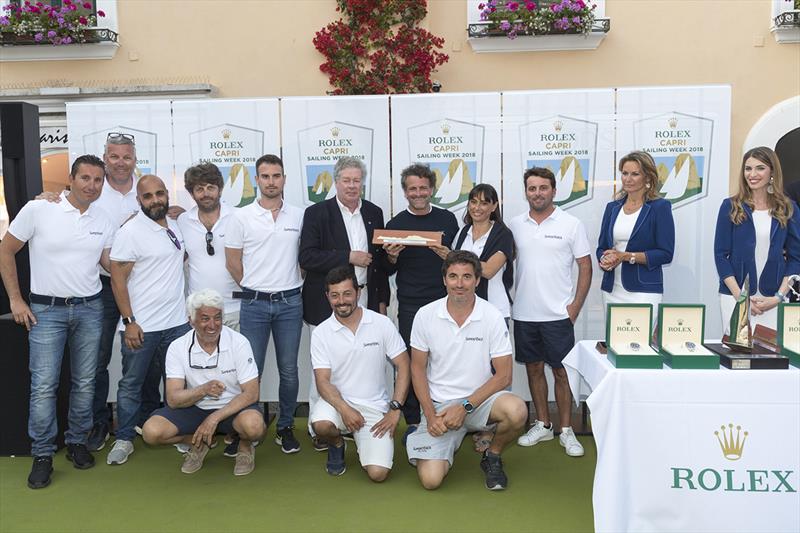 Maxi Racer Cruiser winner Roberto Lacorte is presented with his prize by International Maxi Association Secretary General Andrew McIrvine - Rolex Capri Sailing Week 2018 - photo © Gianfranco Forza