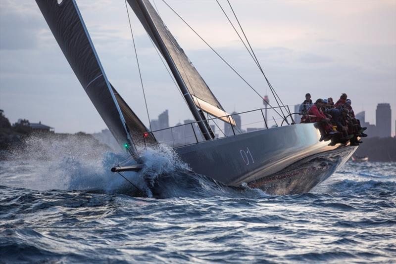 Winning Appliances shoots through Sydney Heads as daylight fades on the Harbour photo copyright Hamish Hardy / CYCA Media taken at Cruising Yacht Club of Australia and featuring the Maxi class