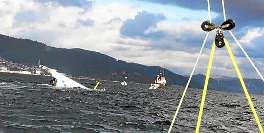 Banque Populaire IX returns under tow to Vigo, Spain photo copyright Planette Voile taken at  and featuring the Maxi class