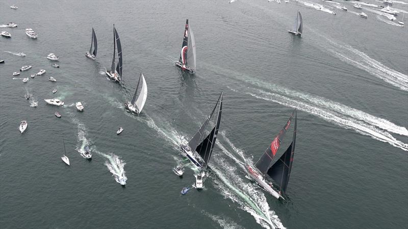 The fleet heads down Sydney Harbour photo copyright Bow Caddy Media taken at Cruising Yacht Club of Australia and featuring the Maxi class