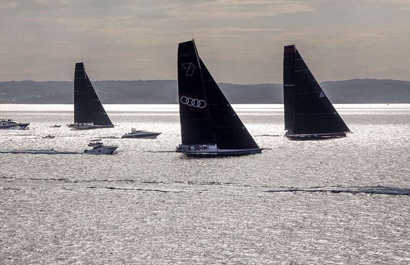 Supermaxis in silhouette photo copyright Crosbie Lorimer taken at Cruising Yacht Club of Australia and featuring the Maxi class