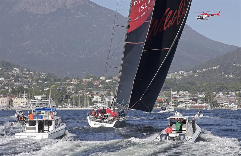 Wild Oats XI crosses the finish line photo copyright Crosbie Lorimer taken at Cruising Yacht Club of Australia and featuring the Maxi class