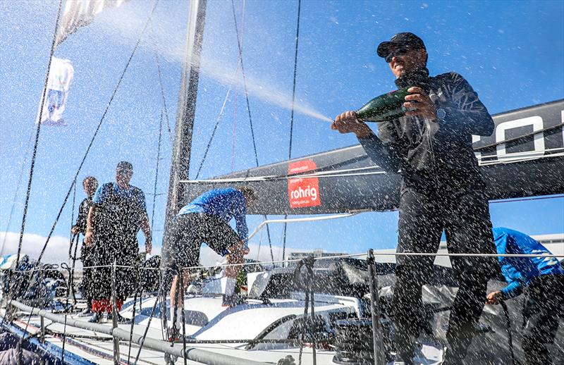 Mark Bradford sprays the champagne aboard Wild Oats XI - photo © Crosbie Lorimer