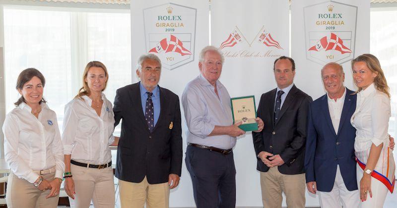 George David receives his Rolex timepiece, the prize for line honours victory (Rambler) in the Rolex Giraglia offshore race photo copyright Stefano Gattini taken at Société Nautique de Saint-Tropez and featuring the Maxi class