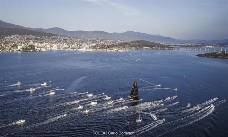 Comanche made the final dash to the Rolex Sydney Hobart finish line contending with fickle breeze ahead of the other four super maxis photo copyright Rolex/Carlo Borlenghi taken at Cruising Yacht Club of Australia and featuring the Maxi class