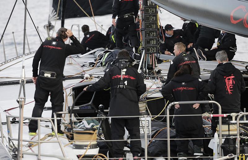 Mike Sanderson scratches his head as the dials show 3.29 knots! photo copyright Crosbie Lorimer taken at Royal Yacht Club of Tasmania and featuring the Maxi class