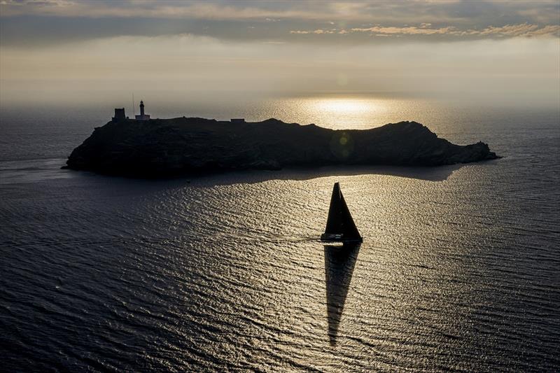 Sir Lindsay Owen-Jones's Magic Carpet Cubed, a two-time Rolex Giraglia line honours winner, rounds the Giraglia rock - photo © Carlo Borlenghi