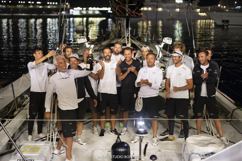 Guido Miani celerates with the crew of Arca SGR - Palermo-Montecarlo race photo copyright ROLEX / Studio Borlenghi taken at Circolo della Vela Sicilia and featuring the Maxi class