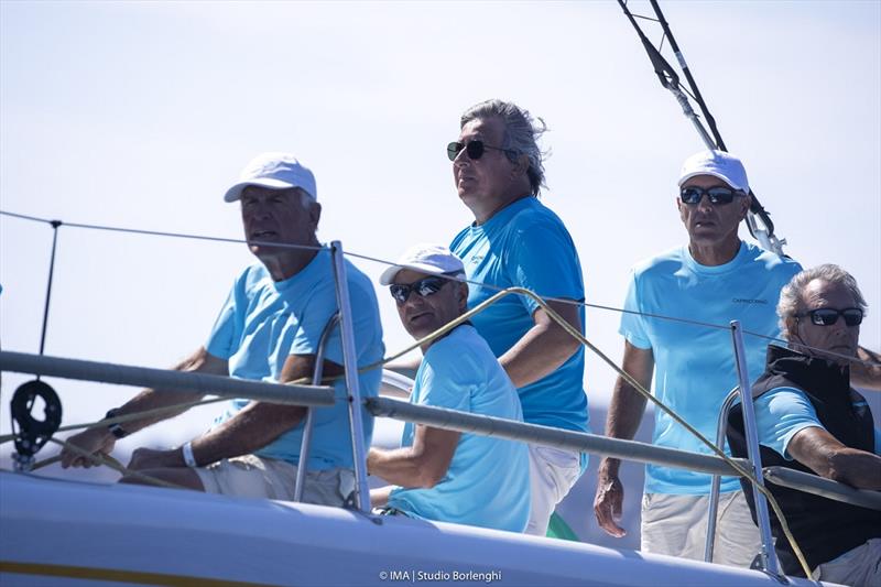 Alessandro Del Bono helming Capricorno with Flavio Favini to the right - Maxi Yacht Rolex Cup - photo © IMA / Studio Borlenghi