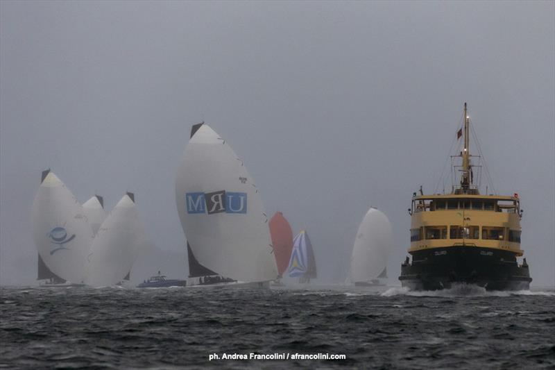 URM lead the battle of the kites after the start in the Cabbage Tree Island race photo copyright Andrea Francolini taken at Cruising Yacht Club of Australia and featuring the Maxi class