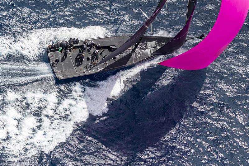 Sir Peter Ogden's all-black Jethou with its characteristics fuchsia coloured spinnaker photo copyright ROLEX / Studio Borlenghi taken at Circolo del Remo e della Vela Italia and featuring the Maxi class