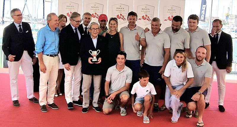 Adriano Calvini with grandson Giovanni Chiappano (in red cap), Rolex Italia's Stefan Müller to his left and, far left, Yacht Club Italiano President Gerolamo Bianchi. - photo © James Boyd / IMA