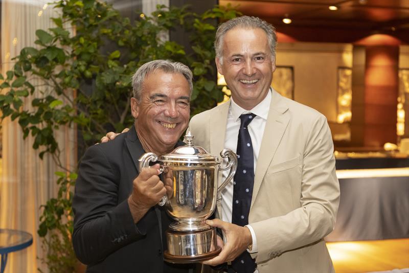 Luciano Gandini is presented with the IMA Yacht of the Year Trophy for the outstanding performance of his Mylius 80 yacht Twin Soul B in 2021 - photo © IMA / Studio Borlenghi