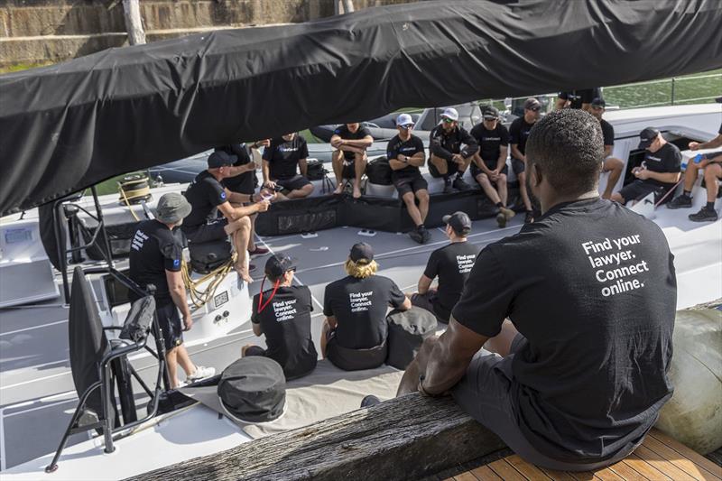 Confab ahead of training for the LawConnect crew photo copyright Andrea Francolini taken at Cruising Yacht Club of Australia and featuring the Maxi class