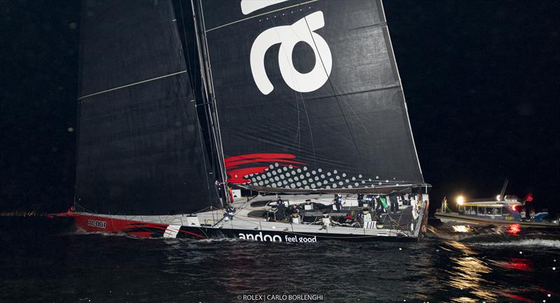 Andoo Comanche about to cross the finish line to be first to finish in the 2022 Rolex Sydney Hobart Race photo copyright Carlo Borlenghi/Rolex taken at  and featuring the Maxi class