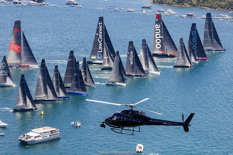 Wild Oats started well back, but recovered the lead at Sydney Heads photo copyright Carlo Borlenghi taken at Cruising Yacht Club of Australia and featuring the Maxi class