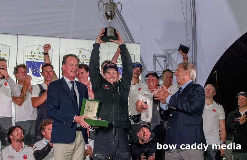John Winning Jnr lifts the Illingworth Trophy aloft photo copyright Bow Caddy Media taken at Cruising Yacht Club of Australia and featuring the Maxi class