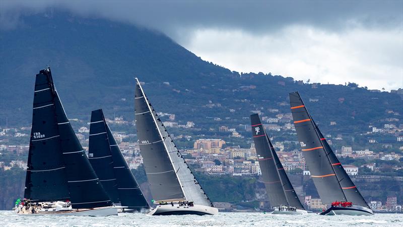 Cannonball and My Song lead the charge away from Sorrento in today's race around Capri - IMA Maxi European Championship photo copyright IMA / Studio Borlenghi taken at  and featuring the Maxi class
