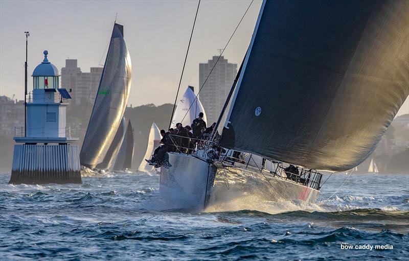 HSK Scallywag passes the Wedding Cake photo copyright Bow Caddy Media taken at Cruising Yacht Club of Australia and featuring the Maxi class