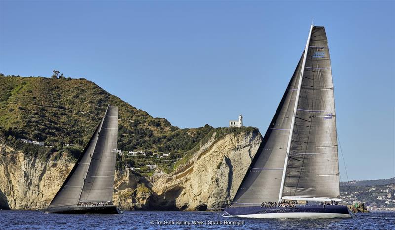 Bullitt and Magic Carpet Cubed exit the Bay of Naples yesterday evening photo copyright Tre Golfi Sailing Week / Studio Borlenghi taken at Circolo del Remo e della Vela Italia and featuring the Maxi class