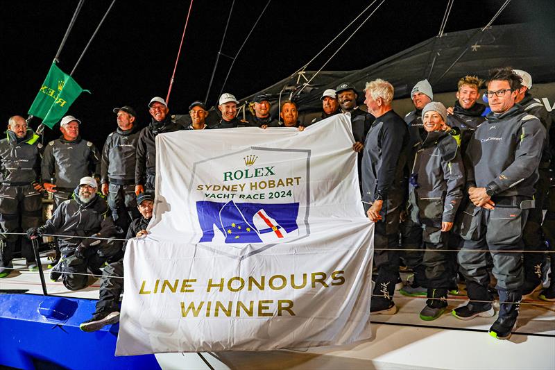 LawConnect's crew dockside in Hobart photo copyright Salty Dingo taken at Cruising Yacht Club of Australia and featuring the Maxi class