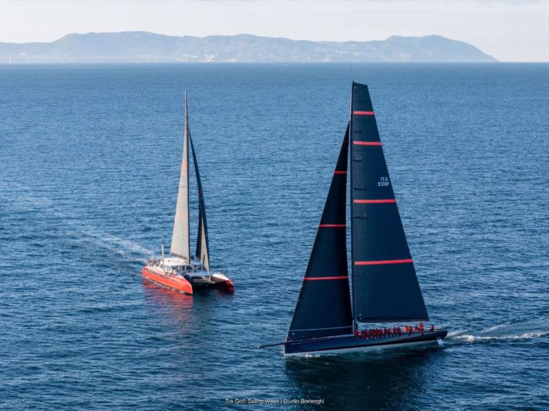 Pier Luigi Loro Piana's My Song arrives at the Naples finish with Lord Irvine Laidlaw's catamaran Highland Fling 18 - photo © Tre Golfi Sailing Week / Studio Borlenghi