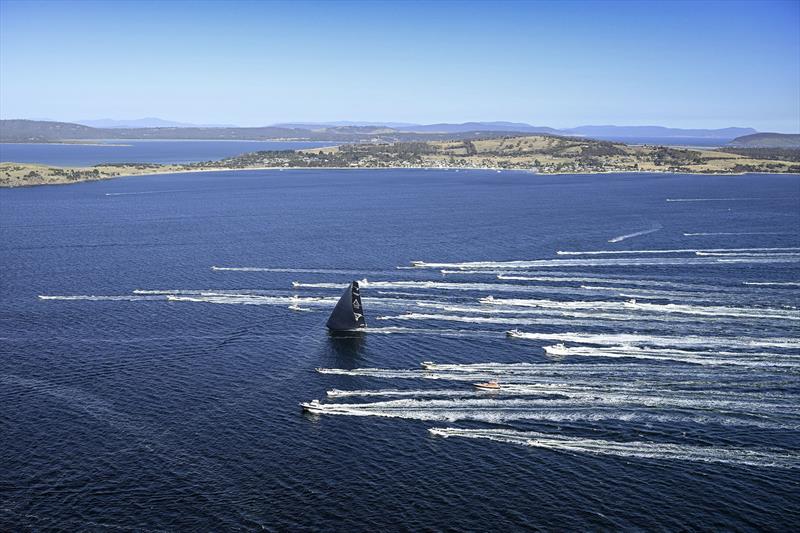 Spectator fleet brings Master Lock Comanche up the River Derwent - photo © Rolex / Kurt Arrigo