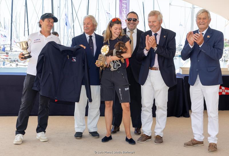 ARCA SGR's Furio Benussi (left) receives the Levainville Trophy for line honours - with Pier Luigi Loro Piana, and YCI and SNST Presidents Carlo Cameli and Pierre Roinson photo copyright Loro Piana / Studio Borlenghi taken at Yacht Club Italiano and featuring the Maxi class