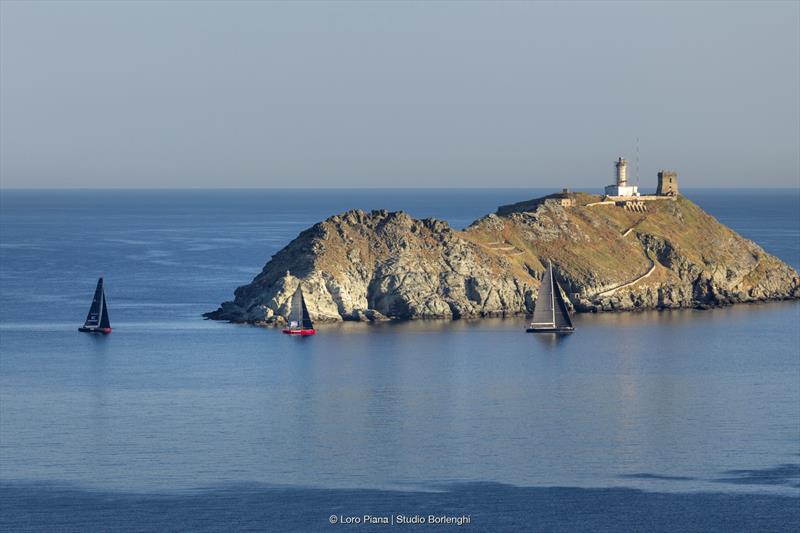 IMA President Maurits van Oranje's Sud (right) passes the Giraglia rock chased by Stefano Brunello's canting Frers 60 Moonshine photo copyright Loro Piana / Studio Borlenghi taken at Yacht Club Italiano and featuring the Maxi class