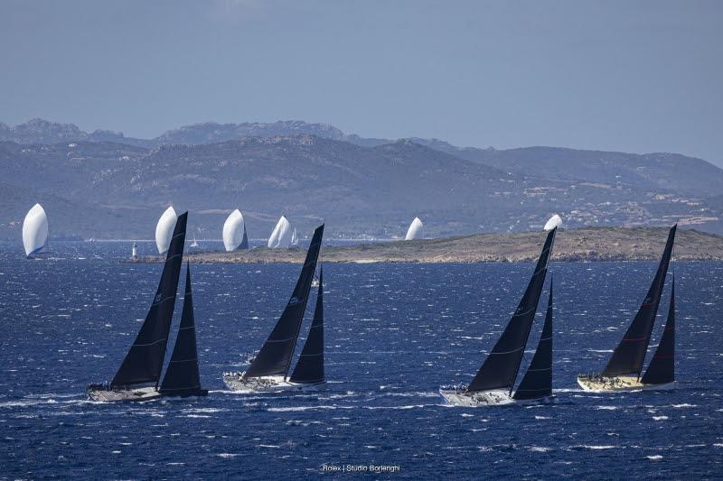 The Maxi Grand Prix class racing upwind, with the Maxi 3 class coastal race in the background, Maxi Yacht Rolex Cup 2026 - photo © Rolex / Studio Borlenghi
