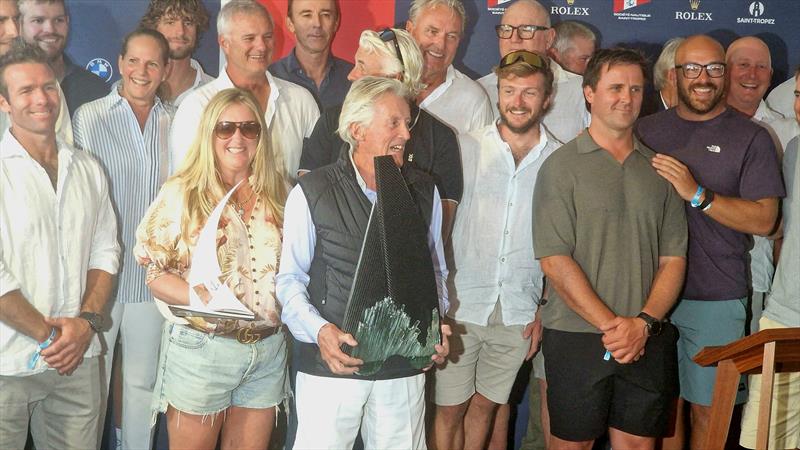 Sir Peter Ogden with Brad Butterworth and Ariane de Rothschild (second from left in striped shirt) at Les Voiles de Saint Tropez 2026  photo copyright IMA taken at Société Nautique de Saint-Tropez and featuring the Maxi class