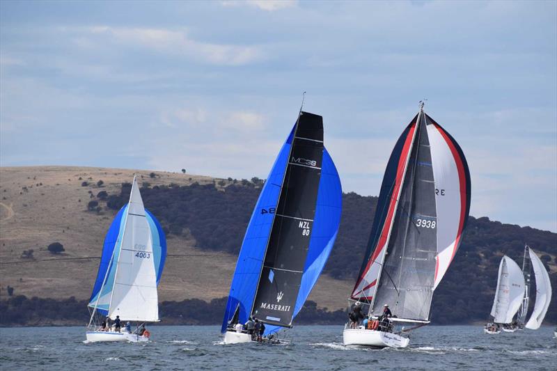 Aeolus (blue kite) relished the conditions on the River Derwent in the 2026 Banjo's Shoreline Crown Series Bellerive Regatta photo copyright Jane Austin taken at Bellerive Yacht Club and featuring the MC38 class