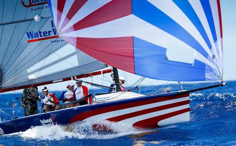 In CSA 6, St. Maarten's Frits Bus and his young crew on Melges 24, Team Island Water World hold a two point advantage on Race Day 4 at Antigua Sailing Week photo copyright Paul Wyeth / www.pwpictures.com taken at Antigua Yacht Club and featuring the Melges 24 class