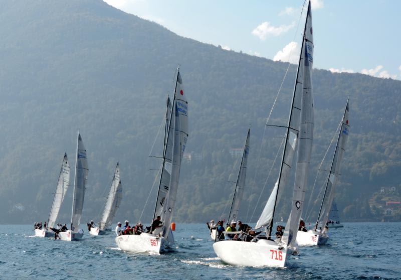 The Melges 24 fleet heading to the upwind mark on Lake Maggiore photo copyright Piret Salmistu taken at  and featuring the Melges 24 class