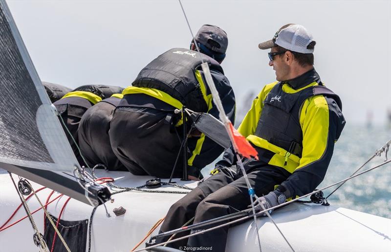 Gian Luca Perego's Maidollis ITA854 with Carlo Fracassoli at the helm holds tight to the top of the standings with 8 points. - Day 2 - Melges 24 European Sailing Series at Riva del Garda, Italy - photo © Mauro Melandri / Zerogradinord