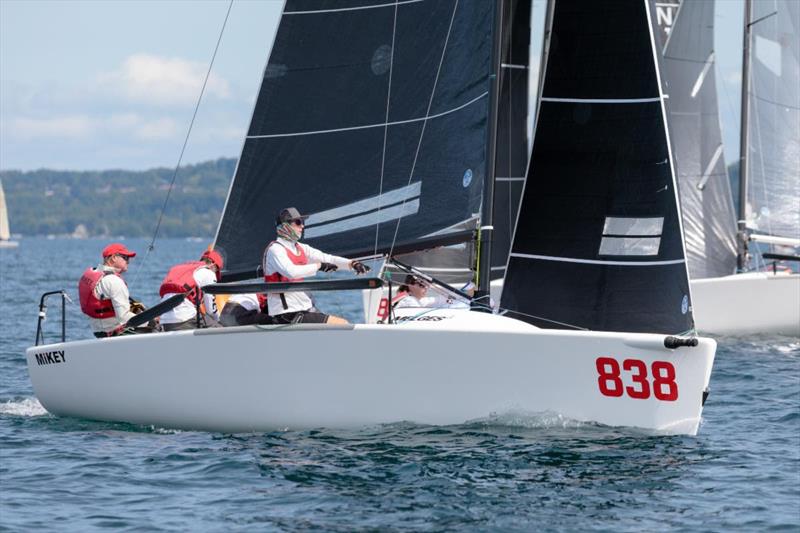 Jeff Madrigali at the helm of Kevin Welch's MiKEY stayed the course to move up from seventh, to third - 2019 Melges 24 North American Championship photo copyright Bill Crawford - Harbor Pictures Company taken at Grand Traverse Yacht Club and featuring the Melges 24 class