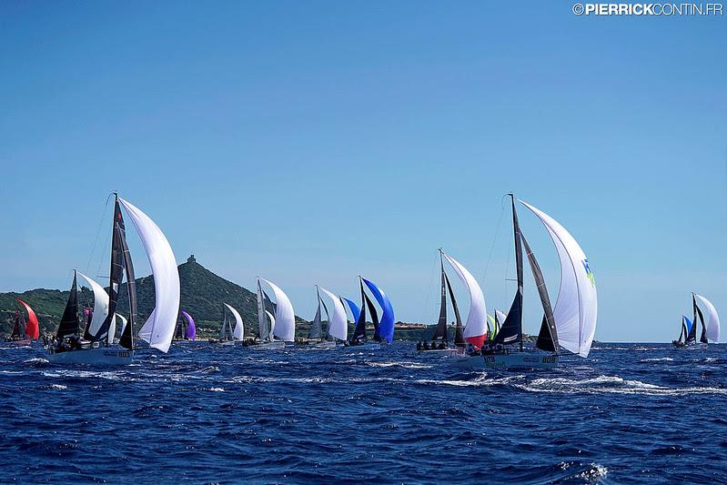 Melges 24 fleet on Day One of the Melges 24 Worlds 2019 in Villasimius photo copyright Pierrick Contin / IM24CA taken at Lega Navale Italiana and featuring the Melges 24 class