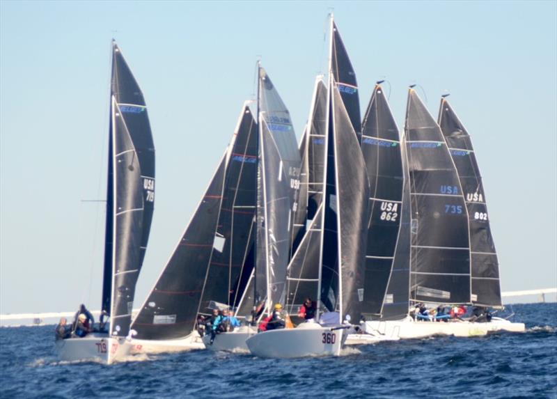 Scott Sonnier from New Orleans leads this pack around the weather mark. Mark roundings were close in racing on both days of the  Pensacola Yacht Club's 2021 Bushwhacker Cup. Four brilliant races were completed on Day 1 and two on Day 2 photo copyright Talbot Wilson taken at Pensacola Yacht Club and featuring the Melges 24 class