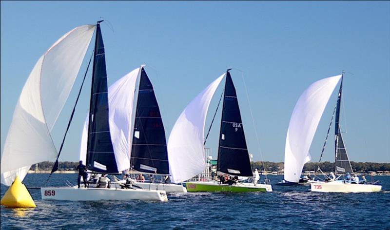 A close finish in Race 5 of the Pensacola YC 2021 Melges 24 Bushwhacker Cup for the Atlantic Coast and Gulf Coast Championships. Of the group USA360 ‘Revolution',  was 6, 859 'Nefeli' was 7,  009 'Friday Night Gigalos' was 8 and 735 'Triple D's' was 9 photo copyright Talbot Wilson taken at Pensacola Yacht Club and featuring the Melges 24 class