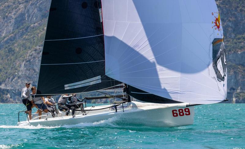 Michele Paoletti on Strambapapà, today 1-1-2-3, took the lead of the pack on Day 1 of the Melges 24 European Sailing Series 2022 event 4 in Riva del Garda, Italy photo copyright IM24CA / Zerogradinord taken at Fraglia Vela Riva and featuring the Melges 24 class