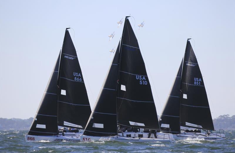 The U.S. Navy's Blue Angels electrify the sky over Pensacola Bay on the opening day of the 2022 U.S. Melges 24 U.S. Nationals at Pensacola Yacht Club photo copyright Joy Dunigan taken at Pensacola Yacht Club and featuring the Melges 24 class