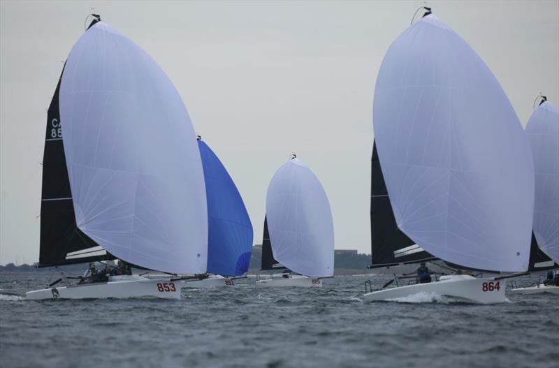 Richard Reid's Zingara (left) and Taylor Canfield driving Dark Energy B Team (right) both enjoyed race wins on Day Two - 2022 U.S. Melges 24 National Championship photo copyright Joy Dunigan taken at Pensacola Yacht Club and featuring the Melges 24 class
