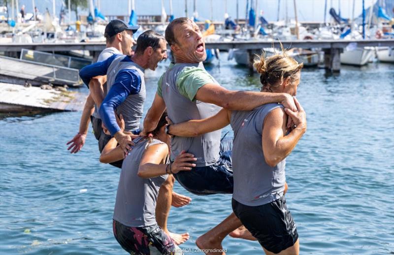 And jump! Team Strambapapa ITA689 - Michele Paoletti, Giovanna Micol, Davide Bivi, Giulia Pignolo and Alexander Harej - Melges 24 European Sailing Series, Fraglia Vela Riva July 2023 photo copyright IM24CA / Zerogradinord taken at Fraglia Vela Riva and featuring the Melges 24 class