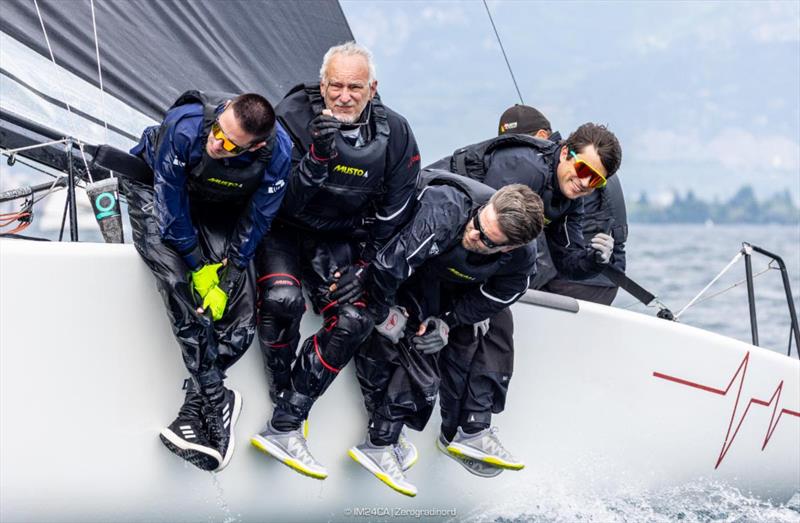 Marco Zammarchi's Taki 4 ITA778 with Niccolo Bertola helming and Lorenzo Di Carlo, Giovanni Bannetta, Giacomo Fossati in crew - 2025 Melges 24 European Sailing Series / Italian Open Championship - Fraglia Vela Riva, Riva del Garda, ITA - photo © IM24CA | Zerogradinord