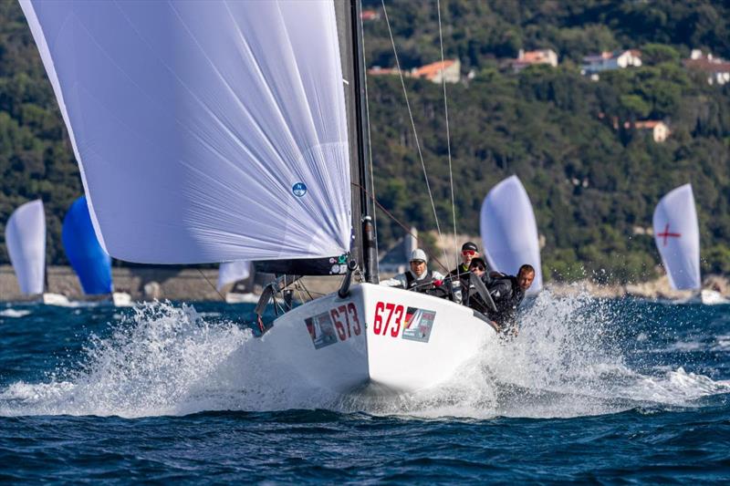 Peter Karrie's NEFELI (GER) with Alessandro Franci, Niccolò Bianchi, Saverio Cigliano, and Karlo Hmeljak, supported by coach Simon Sivitz Kosuta - Melges 24 World Championship 2025, Trieste, Italy - photo © YCA / Giovanni Tesei